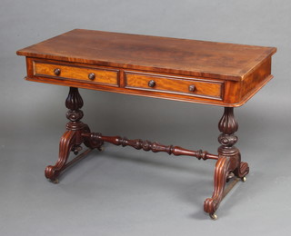 A Victorian mahogany and crossbanded writing table fitted 2 drawers and raised on reeded turned supports with H framed stretcher 76cm h x 122cm w x 61cm d