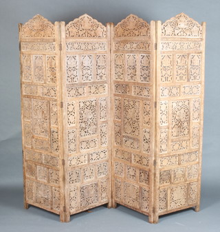 A Indonesian pierced and carved bleached hardwood 4 fold screen 176cm h x 51cm (per panel) 