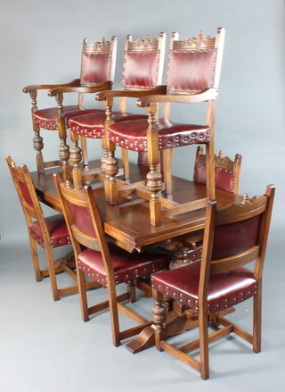 An oak dining suite comprising drawleaf dining table raised on cup and cover supports with H framed stretcher 79cm h x 183cm l x 90cm w and a set of 8 oak dining chairs (2 carvers, 6 standard) the seats and backs upholstered in rexine, raised on turned supports