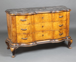 A late 19th Century Italian walnut commode of serpentine outline with black veined marble top, fitted 3 long drawers with bronzed handles, raised on cabriole supports 97cm h x 148cm w x 158cm d 