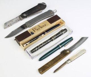 A military style 2 bladed folding knife by Rogers, a silver bladed fruit knife with mother of pearl grip, a folding knife the blade marked Stanley Sheffield England, a Chinese folding knife, a Parker fountain pen and 2 others 