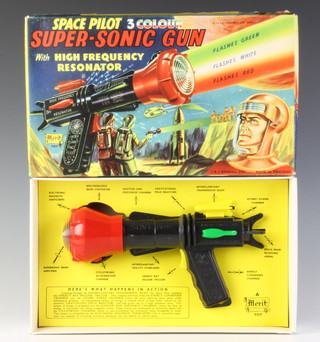 A Space Pilot 3 colour super sonic toy gun by Merit.  Although with "Dan Dare" artwork apparently unlicensed. 