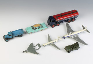 A Dinky 25a light blue open wagon together with a Dinky  192 Desoto Firebird in green and fawn, a Dinky 942 Foden 14 ton Tanker (Regent), a Dinky 702 D.H. Comet Jet Airliner, a Dinky 738 DH 110 Sea Vixen, a Dinky 674 Austin Champ Jeep in olive green and a die cast model of an Air France SE210