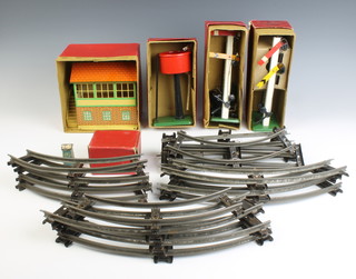 Two Hornby O gauge 42361 no.2 double arm signals boxed, ditto  42370 no.2 signal cabin boxed, ditto 42400 no.1 water tank boxed, ditto 42300 no.1 buffer stop and a small quantity of track 
 
