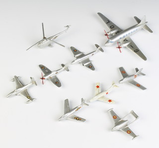 Four Dinky military aircraft unboxed including 70c Viking ,70e Meteor, 70b Tempest 2, 70f Shooting Star together with 5 Mercury military aircraft unboxed including 404 Vampire, 410 Sabre F86 404 Mystere, 412 Mig 15, 417 Sikorsky S55 Helicopter