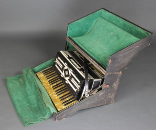 A Frontalini Celeste bass accordion with 120 buttons, complete with carrying case 