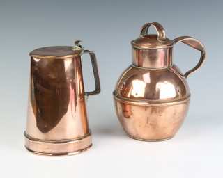 A waisted copper jug with hinged lid 16cm x 11cm together with a copper Jersey milk cannister 18cm x 9cm 