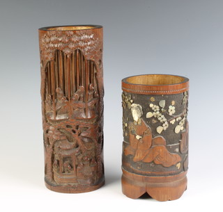 A Chinese carved bamboo and inlaid mother of pearl brush pot 19cm x 10cm and 1 other decorated figures 28cm x 11cm 