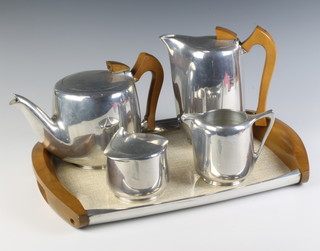 A Picquot Ware a 5 piece tea service comprising tea pot, hot water jug, cream jug, sugar bowl and twin handled tray 