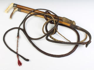 A Swain & Co. hunting crop with stag horn handle, lash and thong, together with a silver and ivory handled hunting crop
