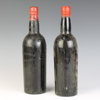 Two unlabelled bottles of 1960 Warre's Port 