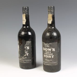 Two bottles of 1963 Dow's vintage port (1 with damaged label)
