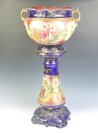 A Royal Crown Coronia jardiniere and stand decorated with panels of figures 81cm 