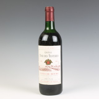 A bottle of 1985 Grand Vin de Bordeaux Chateau Tour des Testeries Cotes de Bourg 