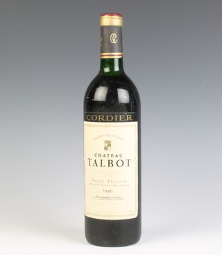 A bottle of 1986 Cordier Grand Cru Classe Chateau Talbot Saint Julien 