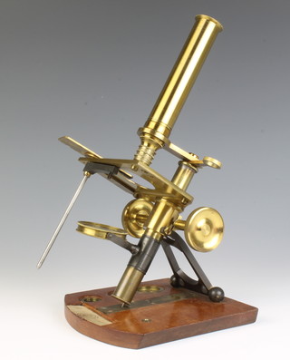 A 19th Century brass single pillar microscope 