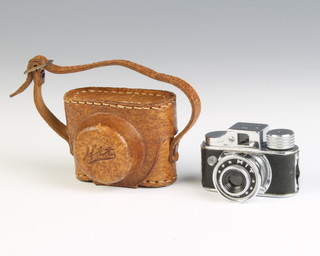 A 1950's HIT miniature camera with leather case