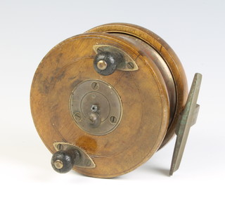 A Milwards Mariner wooden and brass star back fishing reel 