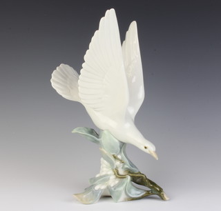 A Lladro figure of a dove 29cm