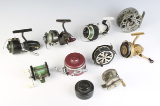 A Mercury patent centre pin fishing reel 10", an Alcock fishing reel, a Colombian no.66 fishing reel and 6 others (1 with spare spool)  