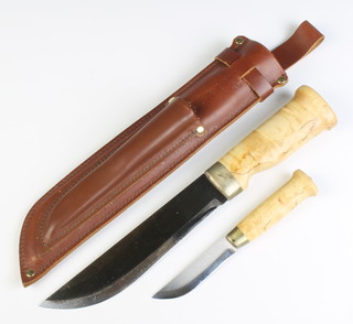 J Marttiini Finland, a hunting knife with 20cm blade together with a ditto filleting knife with 9cm blade contained in a leather scabbard 