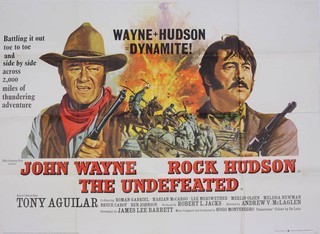 The Undefeated (1969) John Wayne and Rock Hudson, a UK quad movie poster together with 3 Italian locandina - The Battle of the Alamo x 2, Rio Lobo,  a French mini of The Alamo and 8 lobby cards from The Undefeated 