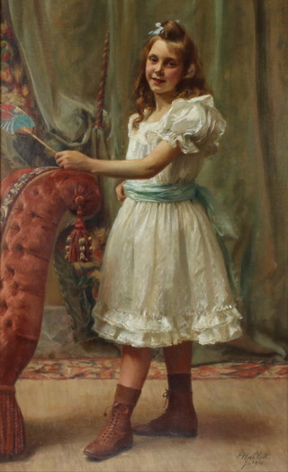 Francois Halkett (1856-1921) oil on canvas signed, portrait of a young girl holding a fan beside a chaise longue 77cm x 47cm 
