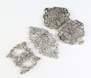 A silver buckle with scroll decoration Birmingham 1995, 1 other and a plated ditto 70 grams