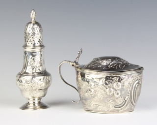 A Georgian silver repousse mustard London 1805 and a ditto pepper 