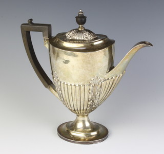 A silver demi-fluted coffee pot of classical form Birmingham 1912, Maker Goldsmiths & Silversmiths Co Ltd 586 grams 