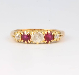 An 18ct yellow gold diamond and ruby ring size K 