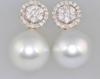 A pair of 18ct white gold pearl and diamond ear drops approx. 1ct 