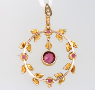 An Edwardian 15ct garnet and seed pearl pendant 