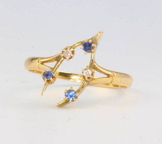 An 18ct yellow gold sapphire and diamond wishbone ring size R 1/2