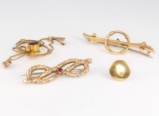 An 18ct yellow gold stud, a 9ct yellow gold brooch, a 15ct ditto and a pendant 