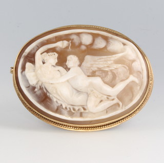 A cameo brooch with classical figures in a 9ct yellow gold mount 