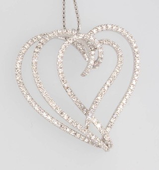An 18ct white gold diamond set intertwined heart pendant on a ditto chain 