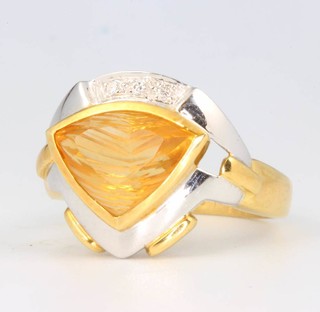 An 18ct yellow gold citrine and diamond ring size L 