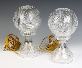 A near pair of cut glass spherical table lamps and bases 30cm 