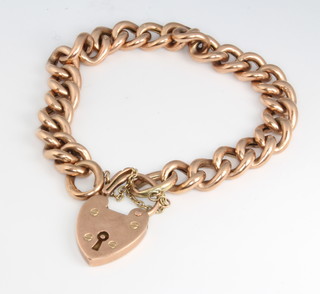 A 9ct yellow gold hollow link bracelet and padlock, 17 grams