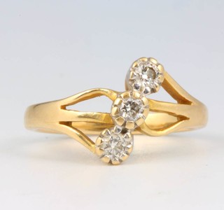 An 18ct yellow gold 3 stone diamond ring size M 