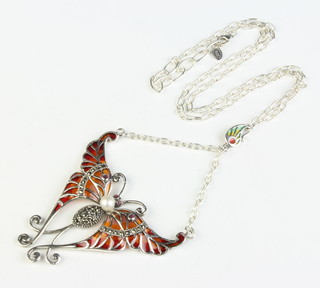 A silver marcasite and enamel butterfly necklace set with an opal 