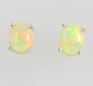 A pair of Ethiopian opal ear studs 