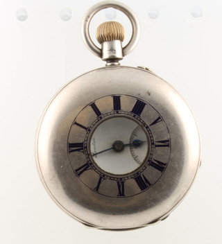 A silver half hunter pocket watch the dial inscribed J  W Benson London