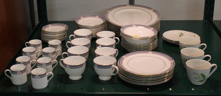 A Wedgwood Waverley design tea, coffee and dinner service comprising 8 coffee cans, 8 saucers, 8 tea cups, 8 saucers, 8 dessert bowls, 7 medium plates, 8 dinner plates, 1 meat plate and 3 Staffordshire tea cups, 2 saucers and a plate 