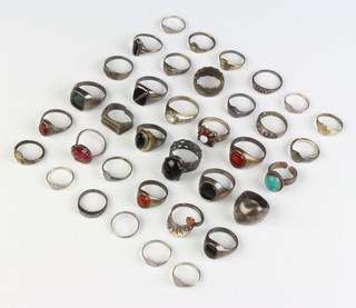 A quantity of silver dress rings 