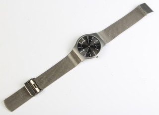 A gentlemans Skagen calendar wrist watch