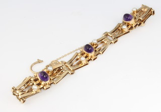A 9ct yellow gold cabochon cut amethyst and pearl gate bracelet 