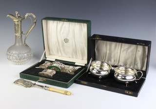 A Victorian silver plated mounted ewer, a cased jug and bowl and 4 plated cigarette lighters 