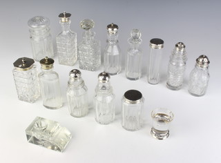 A Victorian silver mounted toilet bottle and minor mounted bottles